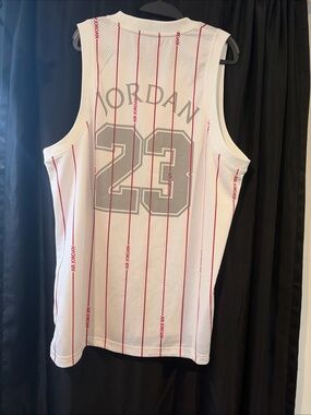 Jordan White Basketball Jersey with Red Pinstripes and Gray 23
